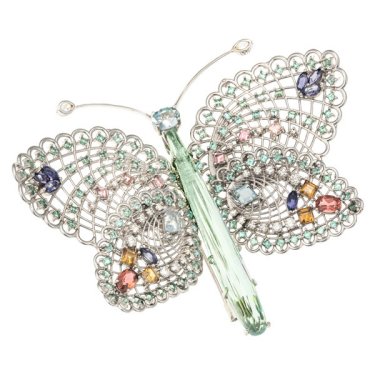 Butterfly brooch/necklace in 18k white gold with 37.33 ct. aquamarine, 4.97 cts. t.w. green tourmaline, 1.69 cts. t.w. yellow beryl, 0.85 ct. t.w. pink tourmaline, 3.27 cts. t.w. aquamarine, 1.96 cts. t.w. iolite, 2.39 cts. t.w. orange zircon, and 1.94 cts. t.w. diamonds, $55,000; Brenda Smith