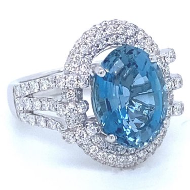Ring in 18k white gold with 4.9 ct. blue topaz and 1.35 cts. t.w. diamonds, price on request; Daviani 