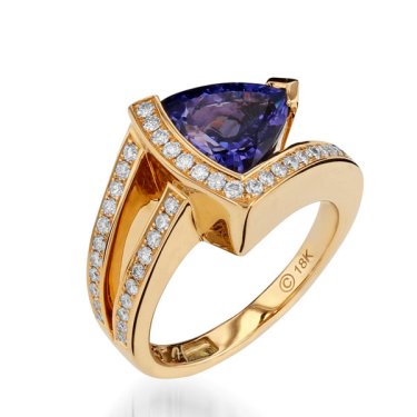 Signature collection ring in 18k yellow gold with trillion tanzanite and 0.43 ct. t.w. diamonds, $6,995; John Atencio 