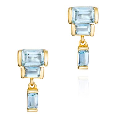 Earrings in gold-plated sterling silver with blue topaz, $220; Jorge Revilla 