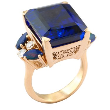 Rainbow collection ring in 18k rose gold with 22.6 ct. tanzanite, 0.75 ct. t.w. opal, and 0.33 ct. t.w. diamonds, price on request; Kouzoupis 