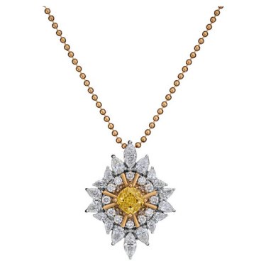 Pendant in 18k yellow and white gold with 1.31 ct. fancy intense yellow diamond and 2.19 cts. t.w. diamonds, price on request; Art of Man and God LLC