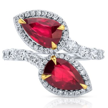 Bypass ring in 18k white and yellow gold with 4.08 cts. t.w. rubies and 1.13 cts. t.w. diamonds, price on request; Ounce Collection