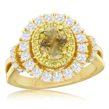 Ring in 18k yellow gold with 1.03 ct. oval zoisite, 0.2 ct. t.w. yellow sapphire, and 0.62 ct. t.w. diamonds