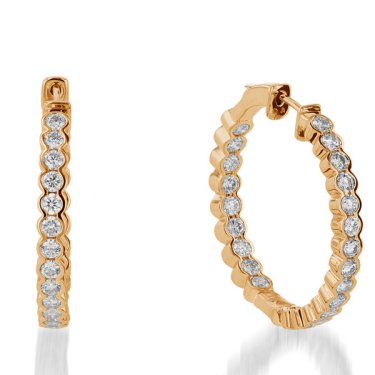 Paloma hoop earrings in 14k yellow gold with 0.65 ct. t.w. diamonds, $6,495; John Atencio