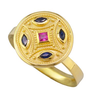 Ring in 18k yellow gold with 0.35 ct. t.w. sapphires and rubies, price on request