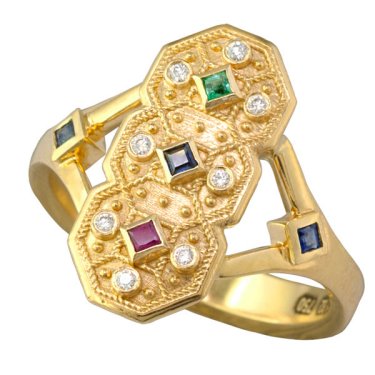 Ring in 18k yellow gold with 0.3 ct. t.w. sapphires, tsavorites, and rubies, and 0.09 ct. t.w. diamonds, price on request 