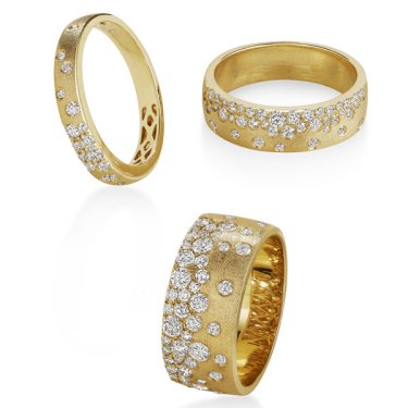 Brushed finished rings in 14k yellow gold with diamonds